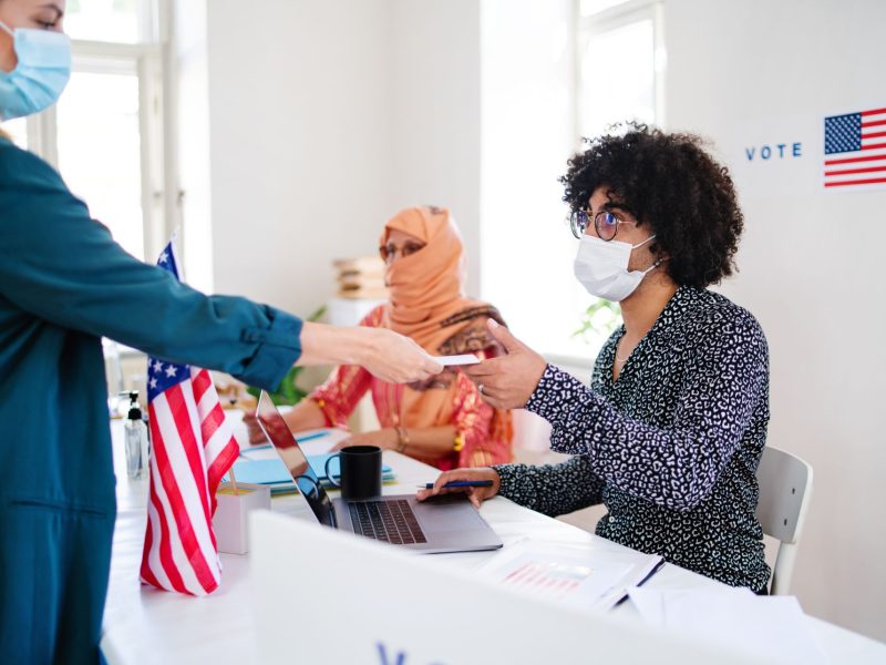 people-with-face-masks-voting-in-polling-place-us-2024-10-21-04-59-32-utc people-with-face-masks-voting-in-polling-place-us-2024-10-21-04-59-32-utc